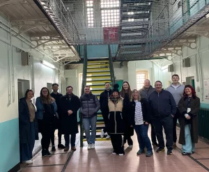 Members of the British Solar Renewables team standing for a photo in Shepton Mallet prison