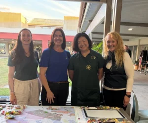 BSR Australia team stood with member of the local community at an event